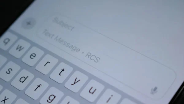 Person looking at phone showing read messages, representing how to respond to someone who left you on read